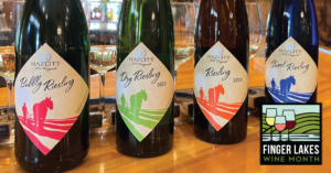 4 bottles of Riesling on a bar top for Finger Lakes Wine Month.